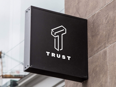 TRUST - projekt logo dla firmy z branży ubezpieczeniowej
